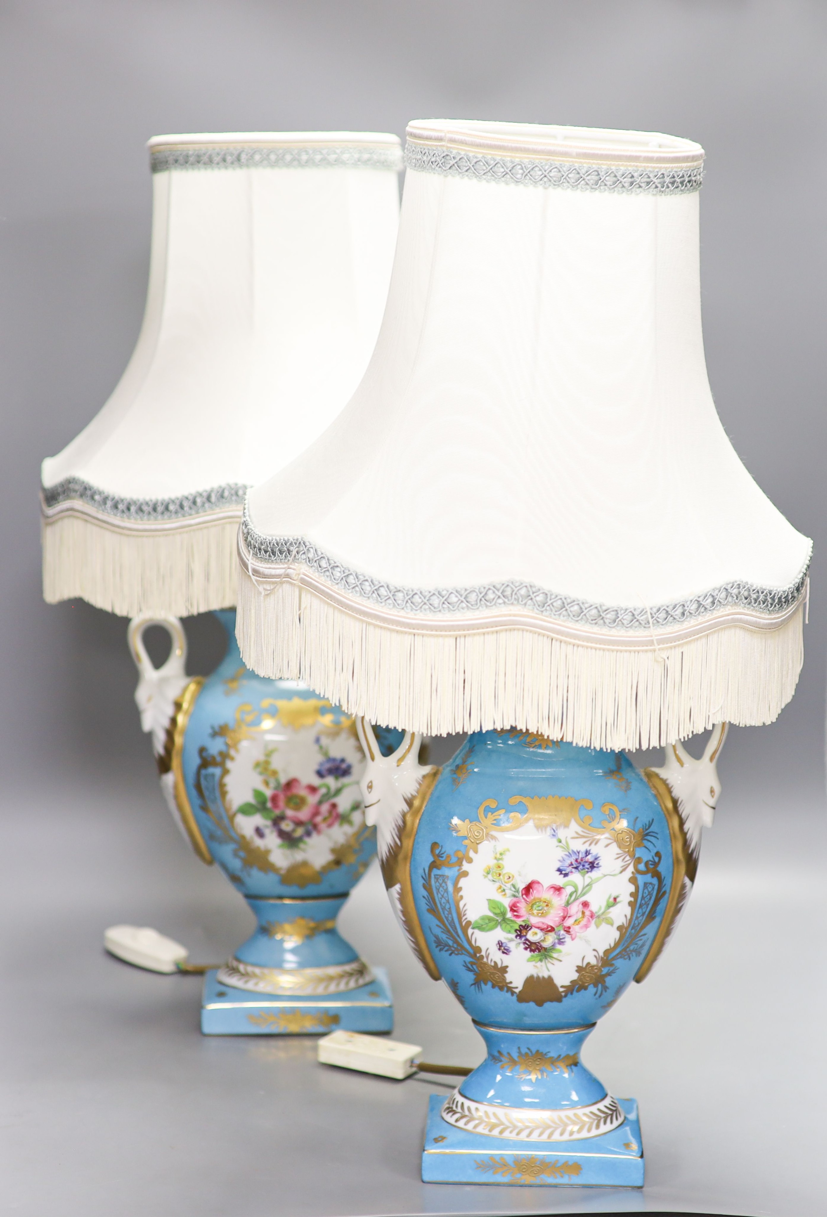 A pair of Sevres style porcelain table lamps with shades 56cm total height incl shades